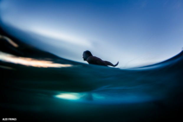 Longboarding at night at wategoes beach byron bay